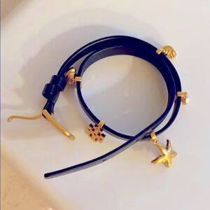 Tory Burch black leather bracelet w/ charms.